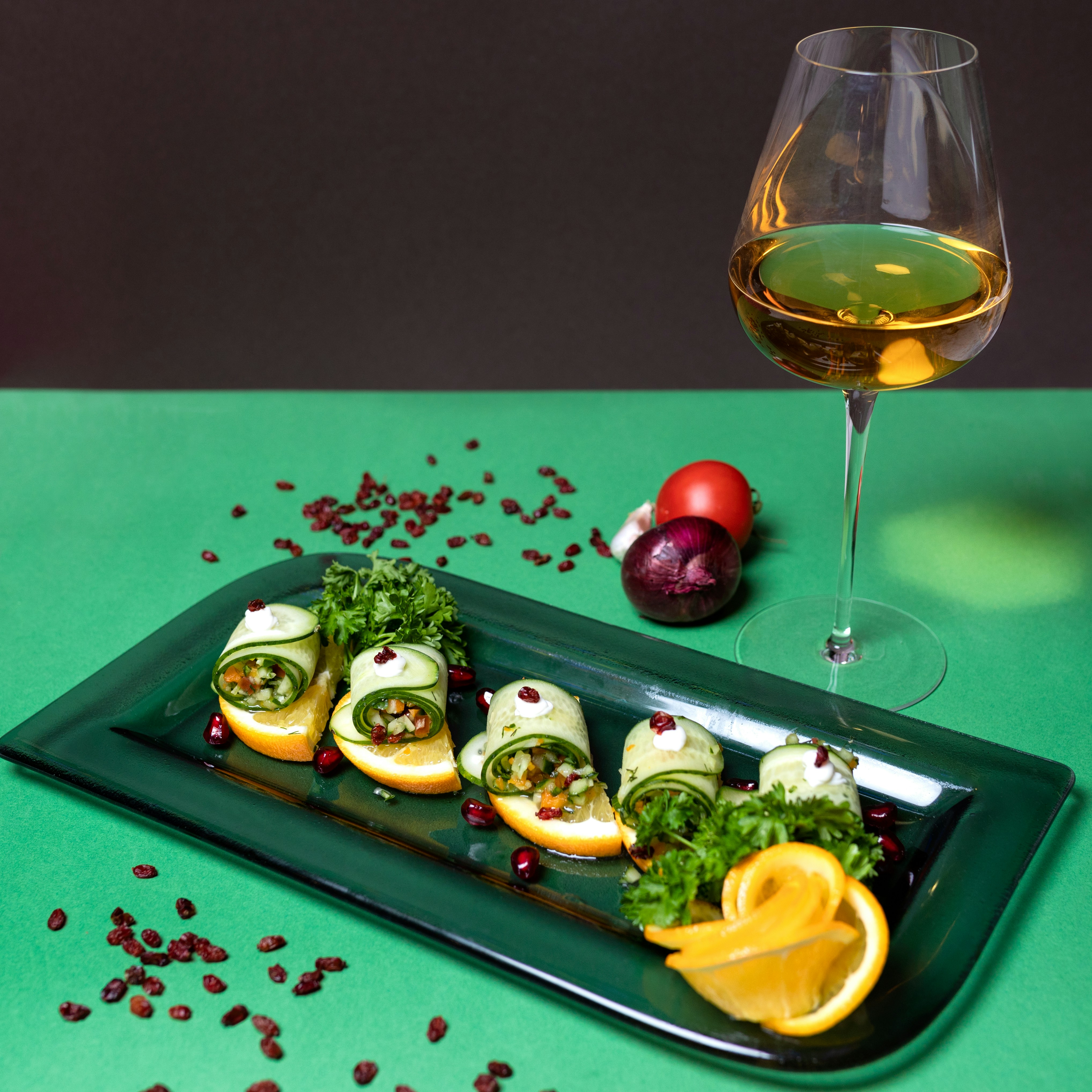 plate with food and a glas wine
